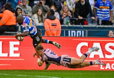 300525 - DHL Stormers v Cardiff Rugby - United Rugby Championship Quarter Final - Seabelo Senatla of the Stormers tackled by Cam Winnett of Cardiff Rugby