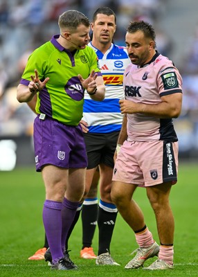 300525 - DHL Stormers v Cardiff Rugby - United Rugby Championship Quarter Final - Referee Eoghan Cross (Ireland) chats with Liam Belcher (Captain) of Cardiff Rugby