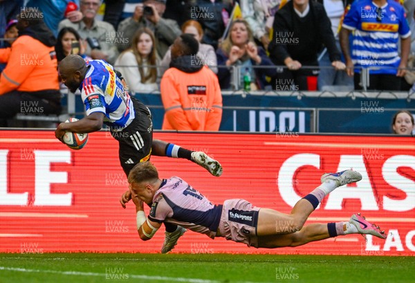 300525 - DHL Stormers v Cardiff Rugby - United Rugby Championship Quarter Final - Seabelo Senatla of the Stormers tackled by Cam Winnett of Cardiff Rugby