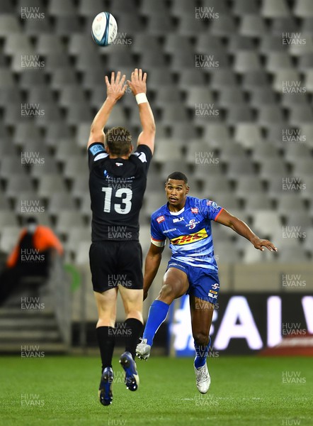020422 - DHL Stormers v Ospreys - United Rugby Championship - Damian Willemse of the Stormers kicks over Mike Collins