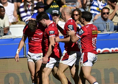 241026 - DHL Stormers v Scarlets - United Rugby Championship Quarter Final - Ioan Jones of the Scarlets celebrates scoring a try with team mates