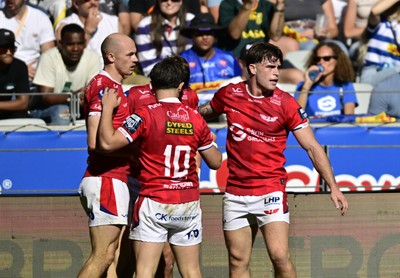 241026 - DHL Stormers v Scarlets - United Rugby Championship Quarter Final - Ioan Jones of the Scarlets celebrates scoring a try with team mates
