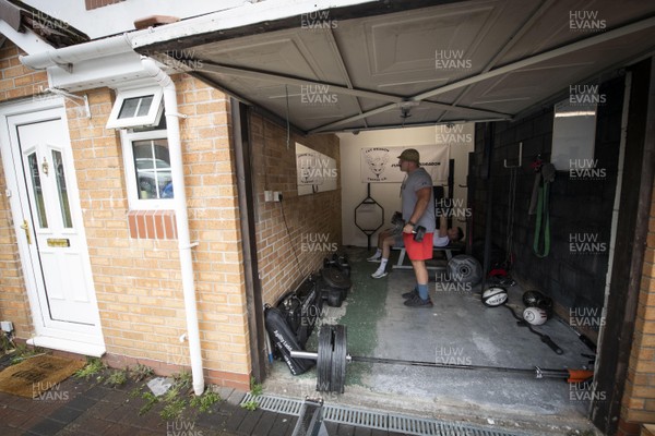 280420 -  Dillon Lewis training at home in Pontypridd in his garage with housemate James Grainger during Coronavius COVID-19 pandemic lockdown