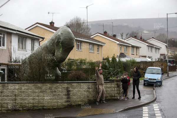 030319 - Picture shows a 15 ft tall dinosaur in the front garden of Jeremy Adams, in Cwmbran, South Wales The dinosaur is to raise money for diabetes charity JDRF