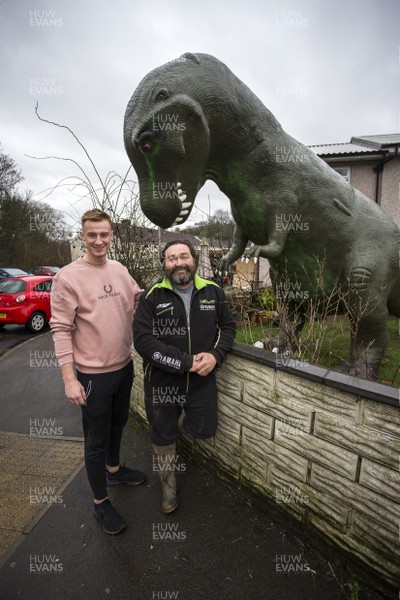 030319 - Picture shows a 15 ft tall dinosaur in the front garden of Jeremy Adams, in Cwmbran, South Wales The dinosaur is to raise money for diabetes charity JDRF - Cory Thomas who helped Jeremy Adam get the dinosaur to his home
