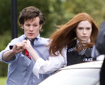 061009 - Doctor Who Filming, Cardiff - The Doctor, played by Matt Smith, and his assistant Amy Pond, played by Karen Gillan, during filming of the new series of Doctor Who in Cardiff