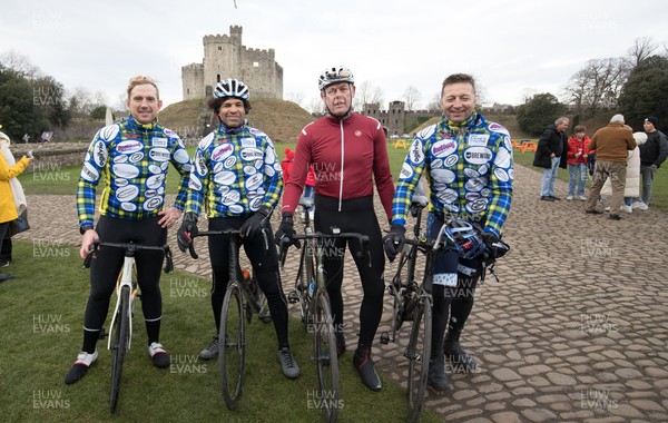 120222 - Wakes v Scotland 2022 Six Nations - Former Wales rugby international players, left to right, Alix Popham, Colin Charvis, Tony Copsey and Ian Gough, arrive at Cardiff Castle  after participating in the Doddie Cup 500 cycle ride which will deliver the match ball to the Principality Stadium for the Wales v Scotland game, and raise funds and awareness for My Name'5 Doddie Foundation