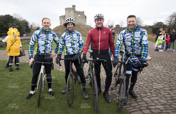 120222 - Wakes v Scotland 2022 Six Nations - Former Wales rugby international players, left to right, Alix Popham, Colin Charvis, Tony Copsey and Ian Gough, arrive at Cardiff Castle  after participating in the Doddie Cup 500 cycle ride which will deliver the match ball to the Principality Stadium for the Wales v Scotland game, and raise funds and awareness for My Name'5 Doddie Foundation