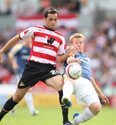 16.08.08...Doncaster Rovers v Cardiff City, Coca Cola Championship. -  Cardiff's Paul Parry tangles with Doncaster's Sam Hird  