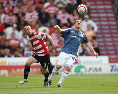 16.08.08...Doncaster Rovers v Cardiff City, Coca Cola Championship. -  Cardiff's Ross McCormack gets away from Doncaster's Gareth Roberts   