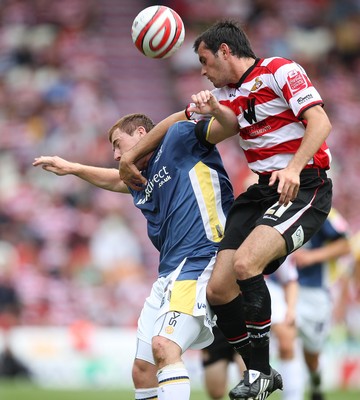 16.08.08...Doncaster Rovers v Cardiff City, Coca Cola Championship. -  Cardiff's Ross McCormack tangles with Doncaster's Sam Hird  