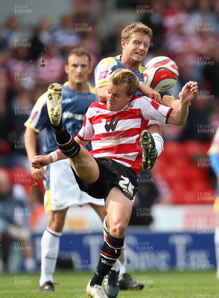 16.08.08...Doncaster Rovers v Cardiff City, Coca Cola Championship. -  Doncaster's James Coppinger  and Cardiff's Stephen McPhail battle for the ball 