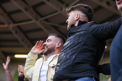 280226 - Doncaster Rovers v Cardiff City - Sky Bet League 1 - Cardiff fans celebrate a goal 