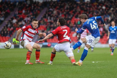 280226 - Doncaster Rovers v Cardiff City - Sky Bet League 1 - Cian Ashford shoots 