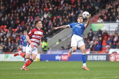 280226 - Doncaster Rovers v Cardiff City - Sky Bet League 1 - Alex Roberston brings the ball under control