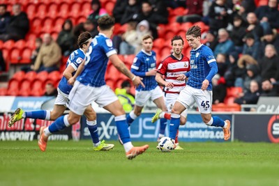 280226 - Doncaster Rovers v Cardiff City - Sky Bet League 1 - Cian Ashford on the ball 