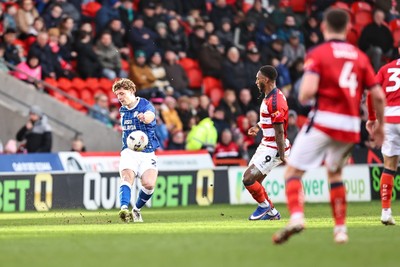 280226 - Doncaster Rovers v Cardiff City - Sky Bet League 1 - Will Fish puts a cross in 