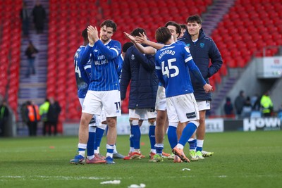 280226 - Doncaster Rovers v Cardiff City - Sky Bet League 1 - Ollie Tanner applauds the Cardiff travelling fans 