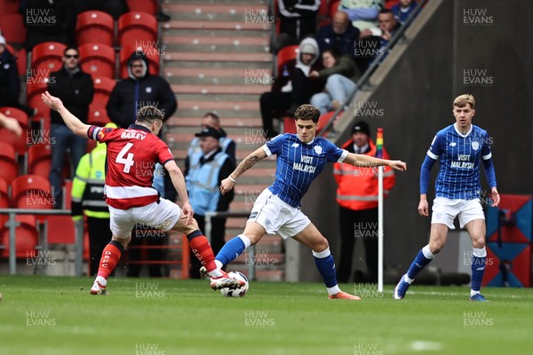 280226 - Doncaster Rovers v Cardiff City - Sky Bet League 1 - Alex Robertson wins the ball 