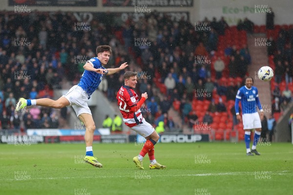 280226 - Doncaster Rovers v Cardiff City - Sky Bet League 1 - Robin Colwill watches his shot 