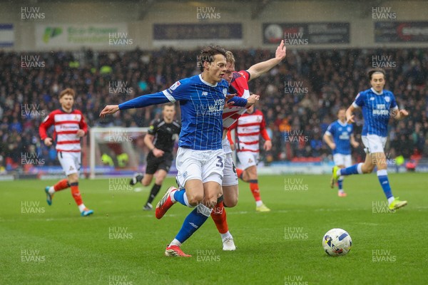 280226 - Doncaster Rovers v Cardiff City - Sky Bet League 1 - Perry NG chases a loose ball 