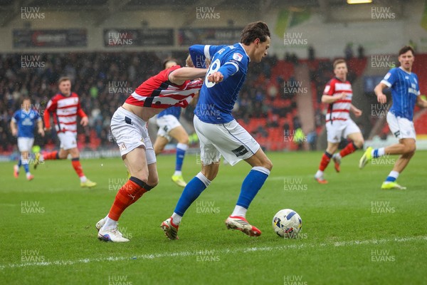 280226 - Doncaster Rovers v Cardiff City - Sky Bet League 1 - Perry NG on the ball