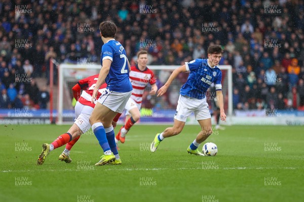 280226 - Doncaster Rovers v Cardiff City - Sky Bet League 1 - Robin Colwill on the ball 