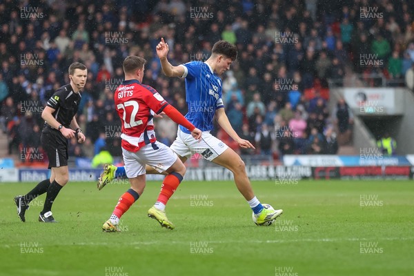280226 - Doncaster Rovers v Cardiff City - Sky Bet League 1 - Robin Colwill prepares to shoot 