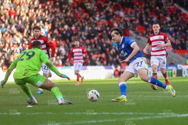 280226 - Doncaster Rovers v Cardiff City - Sky Bet League 1 - Joel Colwill through on goal 
