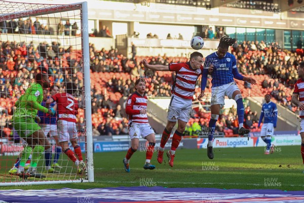 280226 - Doncaster Rovers v Cardiff City - Sky Bet League 1 - Gabriel Osho heads for goal 