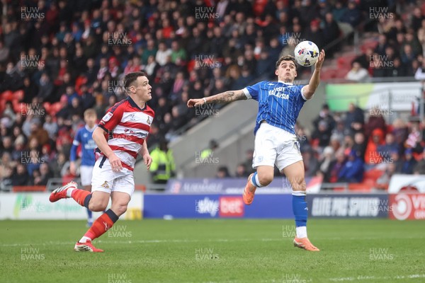 280226 - Doncaster Rovers v Cardiff City - Sky Bet League 1 - Alex Roberston brings the ball under control