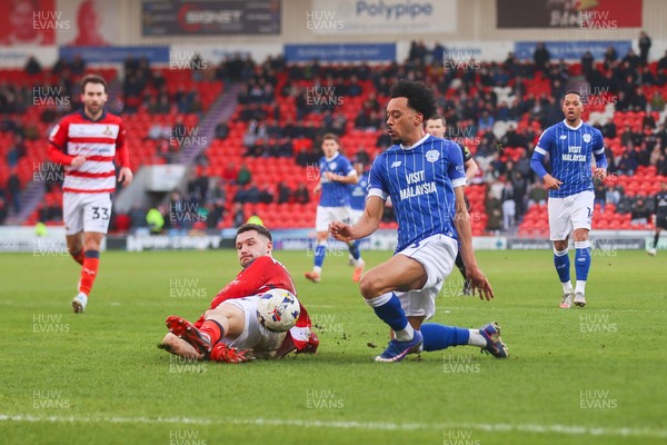 280226 - Doncaster Rovers v Cardiff City - Sky Bet League 1 - Calum Scanlon sees his cross blocked 