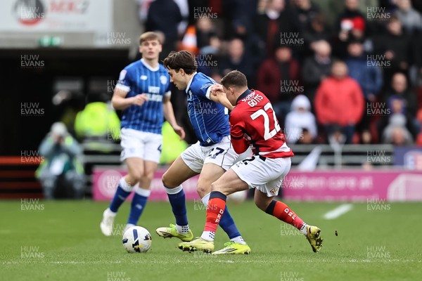 280226 - Doncaster Rovers v Cardiff City - Sky Bet League 1 - Jacob Colwill shields the ball from Robbie Gotts 