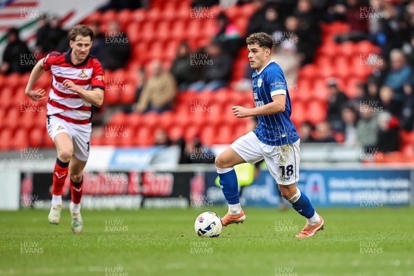280226 - Doncaster Rovers v Cardiff City - Sky Bet League 1 - Alex Robertson on the ball 
