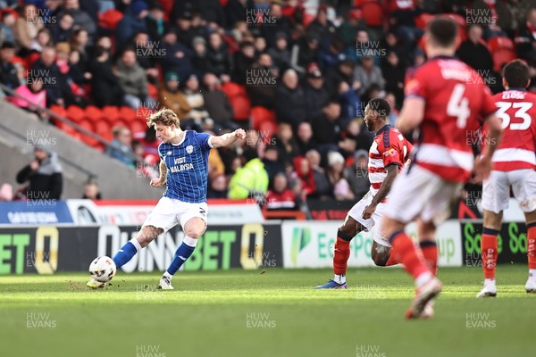 280226 - Doncaster Rovers v Cardiff City - Sky Bet League 1 - Will Fish crosses the ball 