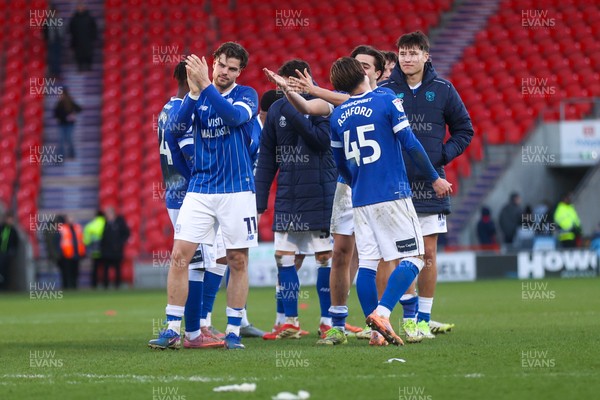 280226 - Doncaster Rovers v Cardiff City - Sky Bet League 1 - Ollie Tanner applauds the Cardiff travelling fans 