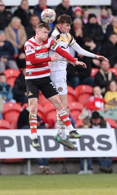 010325 - Doncaster Rovers v Newport County - Sky Bet League 2 - Joe Thomas of Newport and James Maxwell of Doncaster Rovers