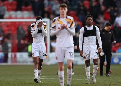 010325 - Doncaster Rovers v Newport County - Sky Bet League 2 - Kyle Jameson (23) and Bobby Kamwa (7) of Newport County after the match