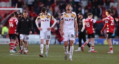 010325 - Doncaster Rovers v Newport County - Sky Bet League 2 - Dejected Newport team salute the fans at the end of the match