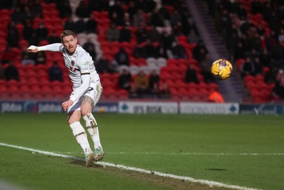 130124 - Doncaster Rovers v Newport County - Sky Bet League 2 - Scot Bennett of Newport clears 