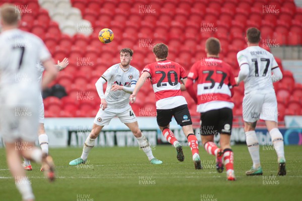 130124 - Doncaster Rovers v Newport County - Sky Bet League 2 - Ryan Delany of Newport prepares to head the ball