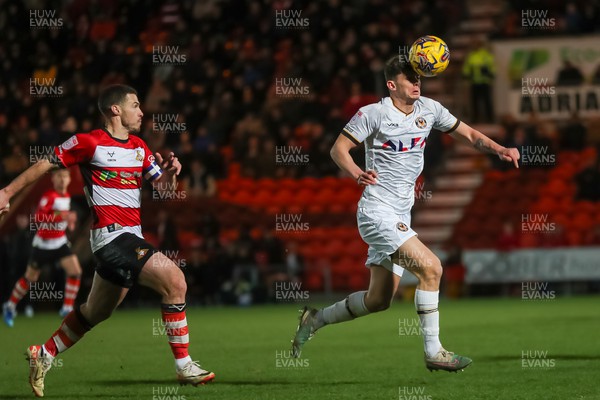 130124 - Doncaster Rovers v Newport County - Sky Bet League 2 - Seb Palmer-Houlden of Newport runs with the ball