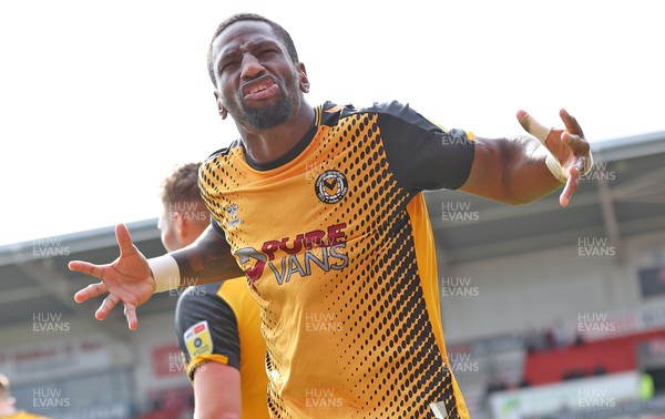 220423 - Doncaster Rovers v Newport County - Sky Bet League 2 - Aaron Wildig of Newport County celebrates scoring their 2nd goal with Omar Bogle of Newport County whipping up the away fans