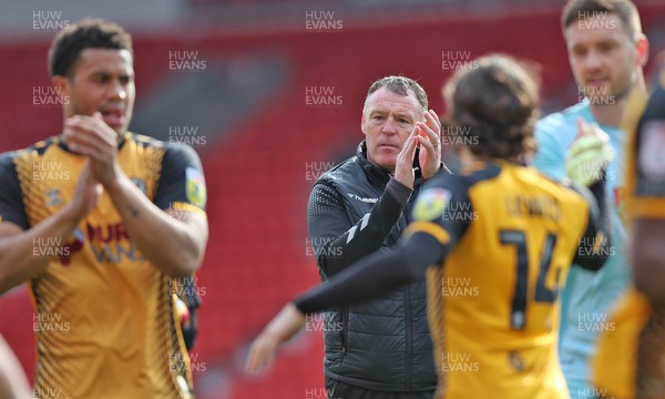 220423 - Doncaster Rovers v Newport County - Sky Bet League 2 - Manager Graham Coughlan of Newport County applauds the fans at the end of the match