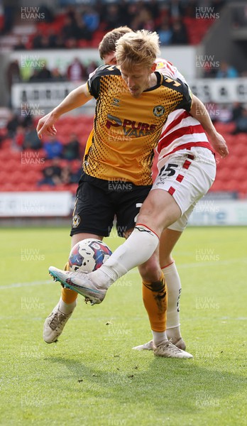 220423 - Doncaster Rovers v Newport County - Sky Bet League 2 - Hayden Lindley of Newport County and Adam Long of Doncaster Rovers