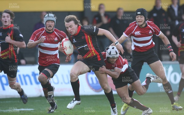 23.03.11 -  Dragons Academy v Japan High Schools -  Dragons Academy's Thom Ashmead is tackled by Japan High School's Ryohei Murashima  