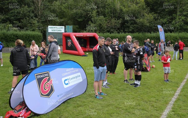 270821 - Dragons Open Training Session at Abertillery BG RFC - Supporters look on during an open Dragons training session in front of supporters at Abertillery Park