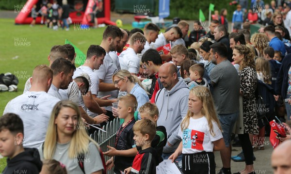 270821 - Dragons Open Training Session at Abertillery BG RFC - Dragons players sign autographs for fans after an open training session in front of supporters at Abertillery Park