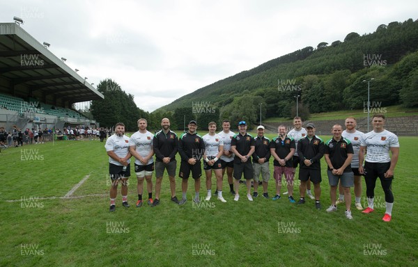 270821 - Dragons Open Training Session at Abertillery BG RFC - Dragons players with Abertillery BG RFC members after an open training session in front of supporters at Abertillery Park