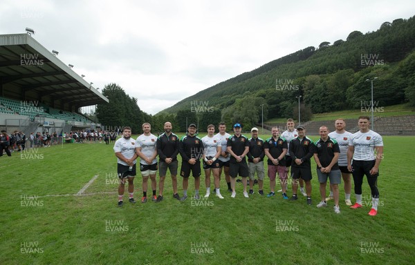 270821 - Dragons Open Training Session at Abertillery BG RFC - Dragons players with Abertillery BG RFC members after an open training session in front of supporters at Abertillery Park